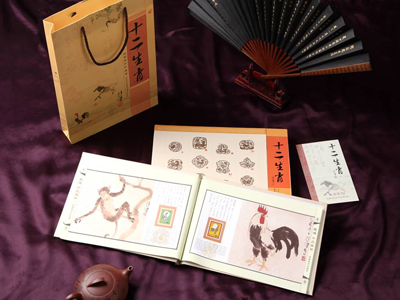 中英文版絲綢郵票珍藏書《十二生肖》